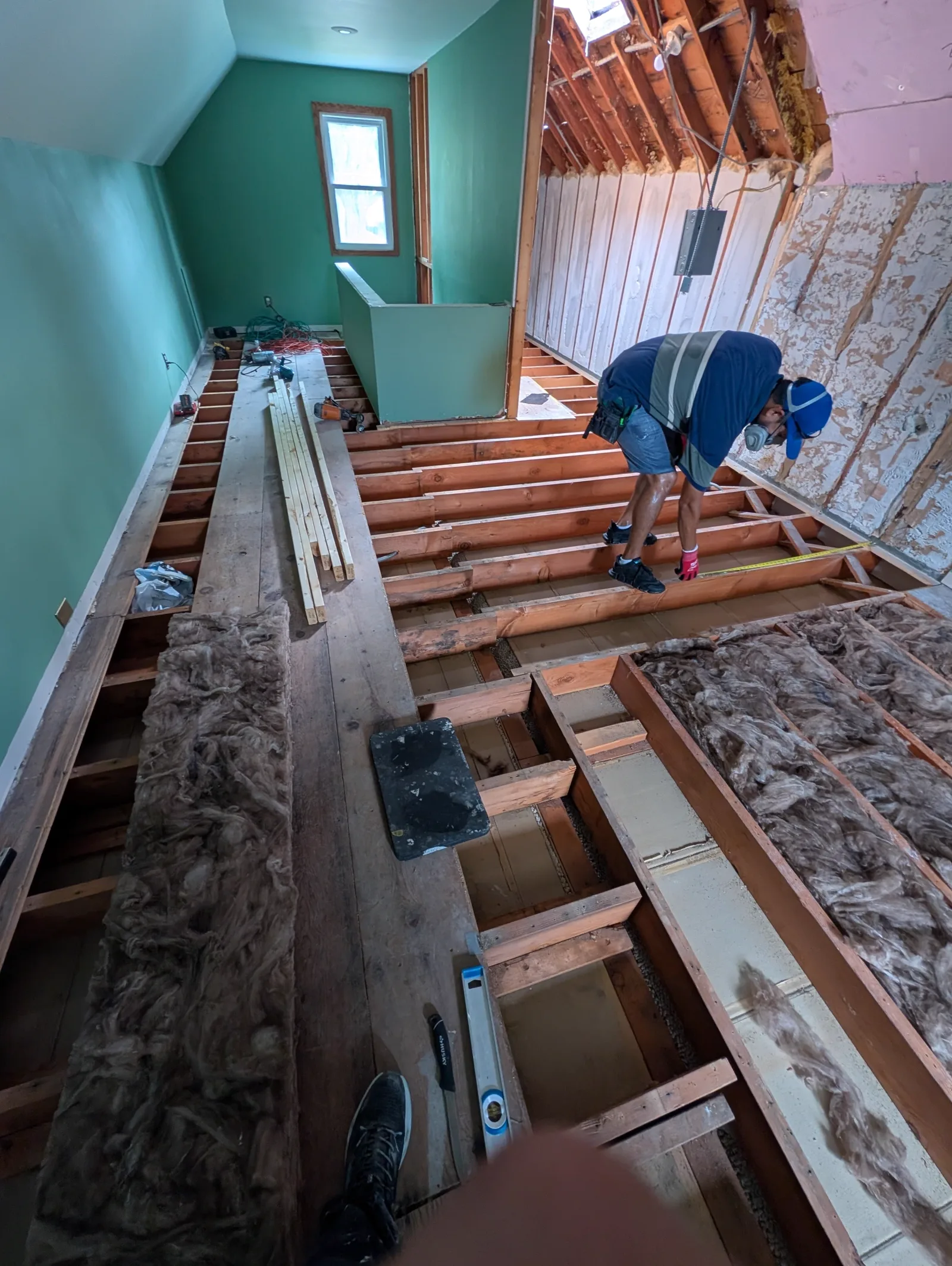Old insulation out, joists exposed